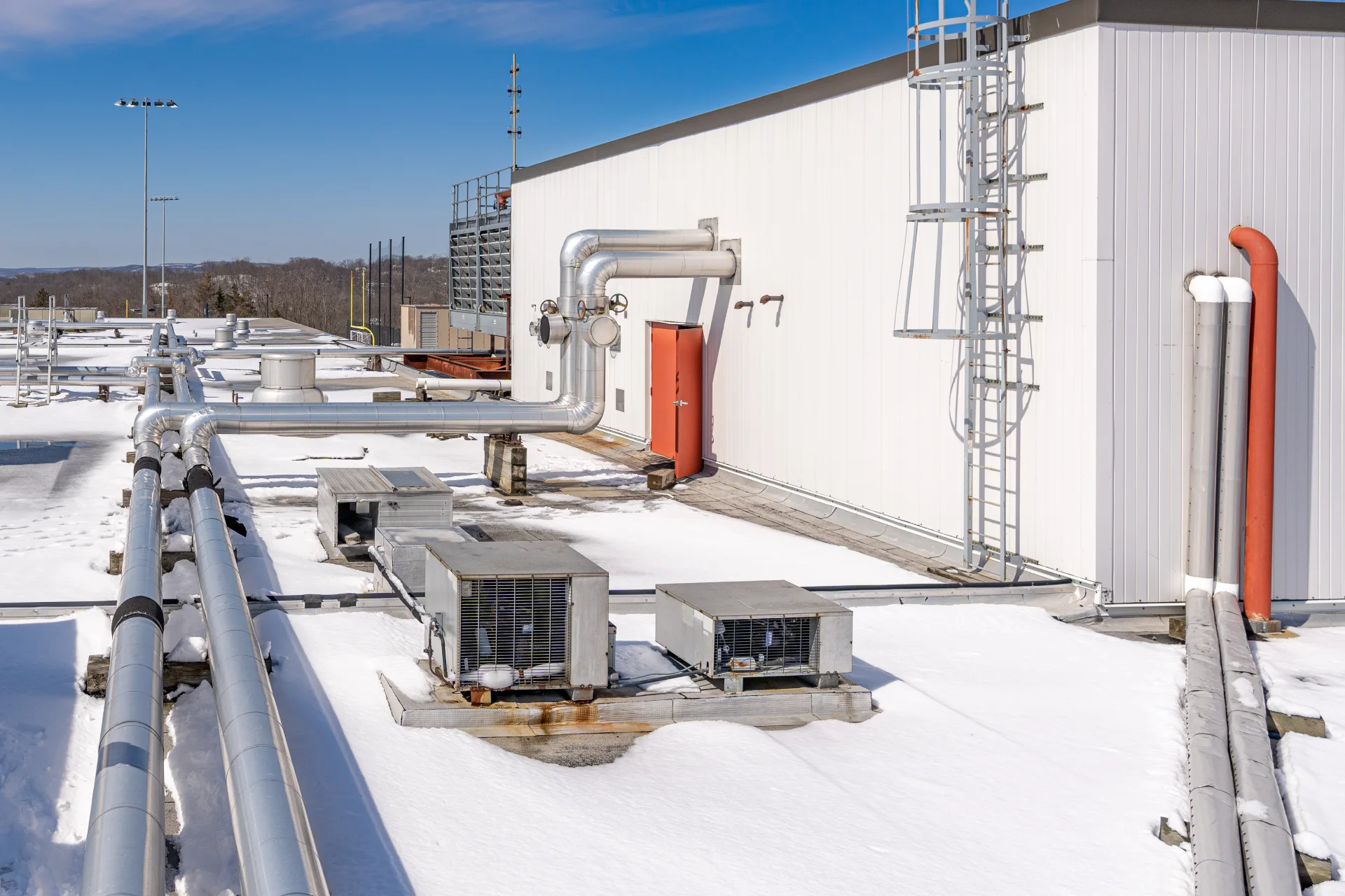 picture of snowy rooftop hvac chiller